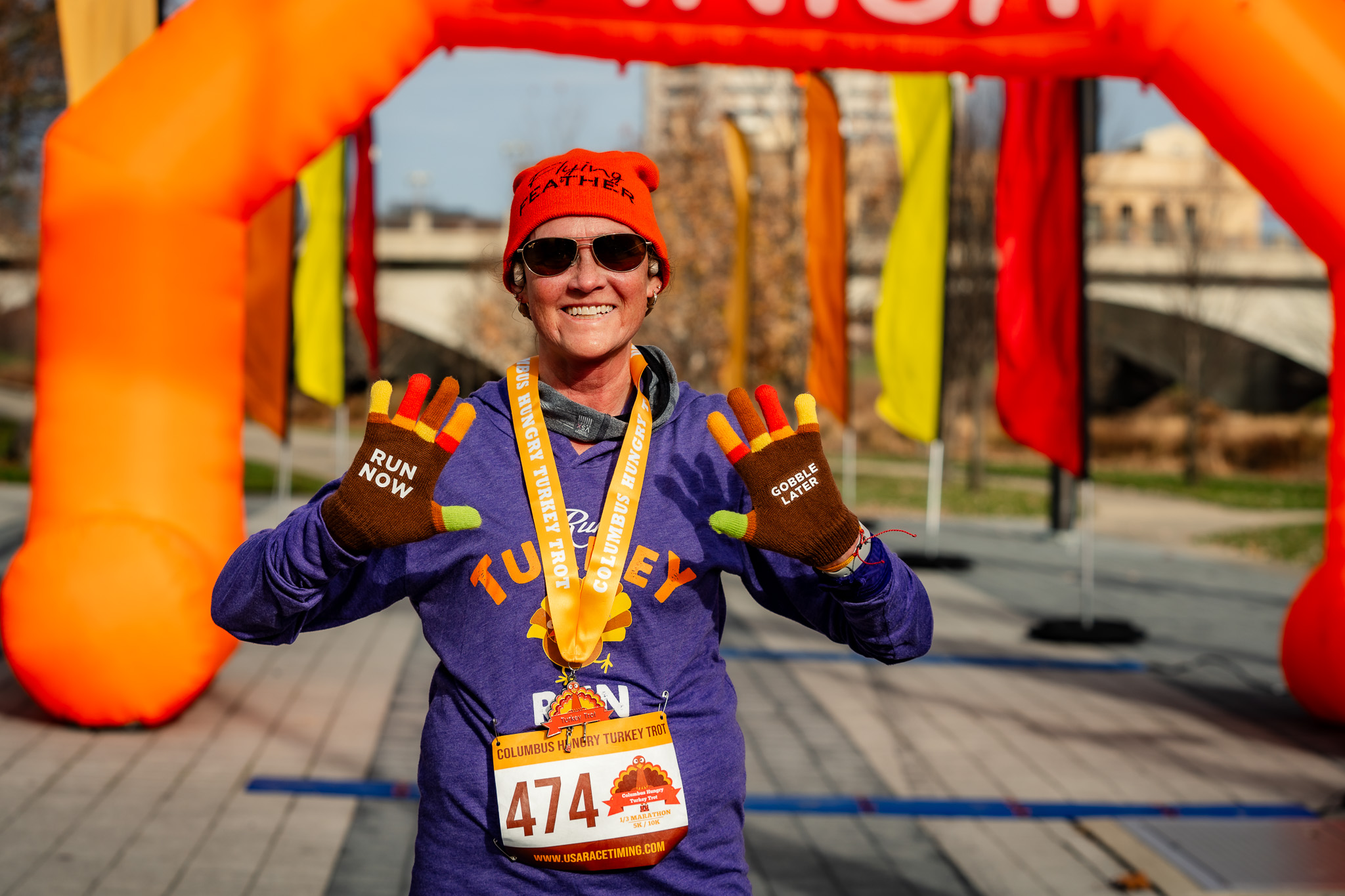 Turkey Trot Finisher - Columbus Hungry Turkey Trot - Columbus Turkey Trot - USA Race Timing & Event Management - LeVeque Tower - Downtown Columbus, Ohio - Feather Flags - Start Line - Finish Line - COSI - Genoa Park - Columbus 5k - Columbus 10k - Columbus 1/3 Marathon - Columbus Half Marathon - Columbus Marathon